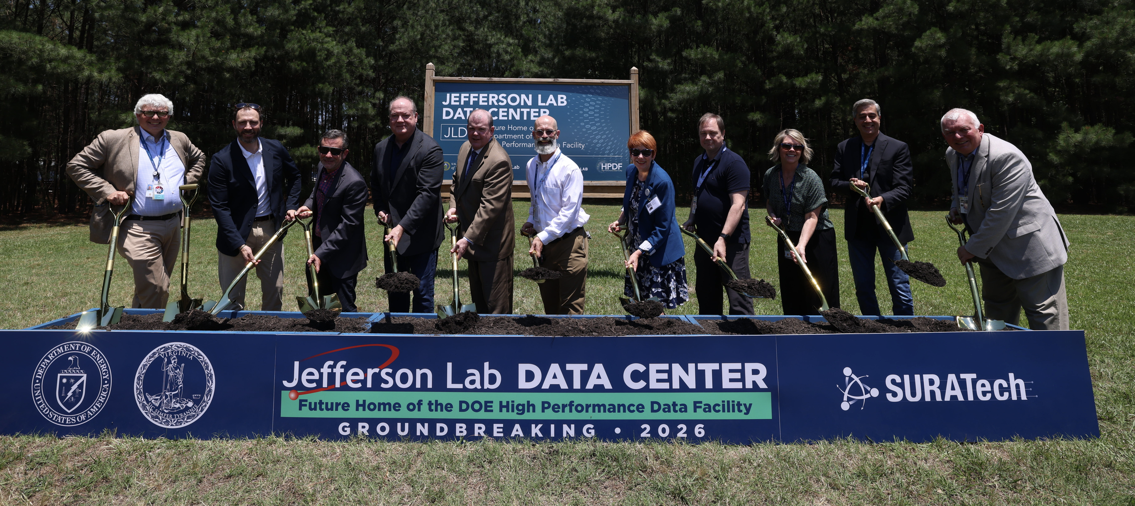 Members of the HPDF Project team, along with other lab colleagues, pose with shovels at the June 10, 2026, groundbreaking for the future home of the High Performance Data Facility.